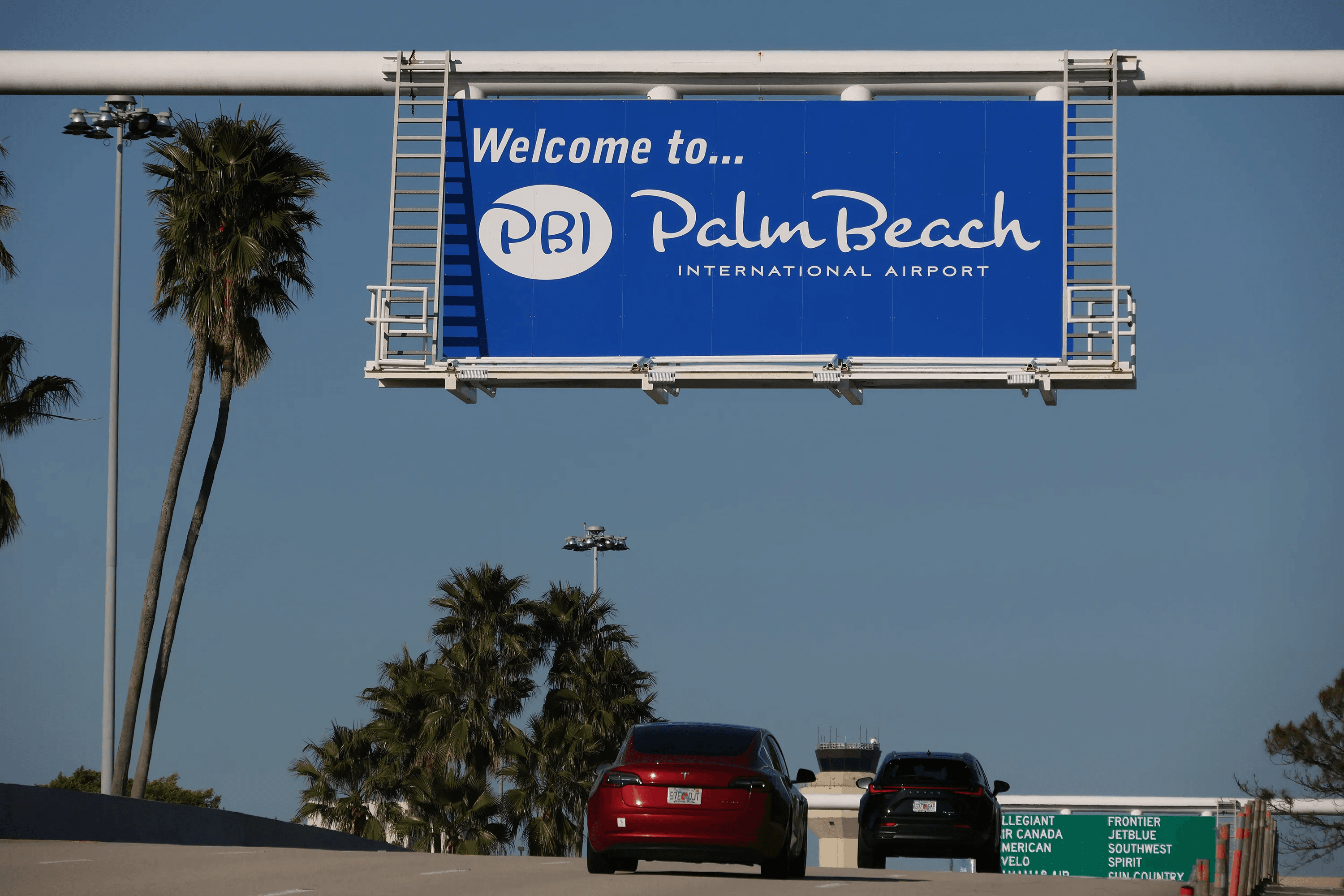 The Welcome to Palm Beach International Airport highway sign
