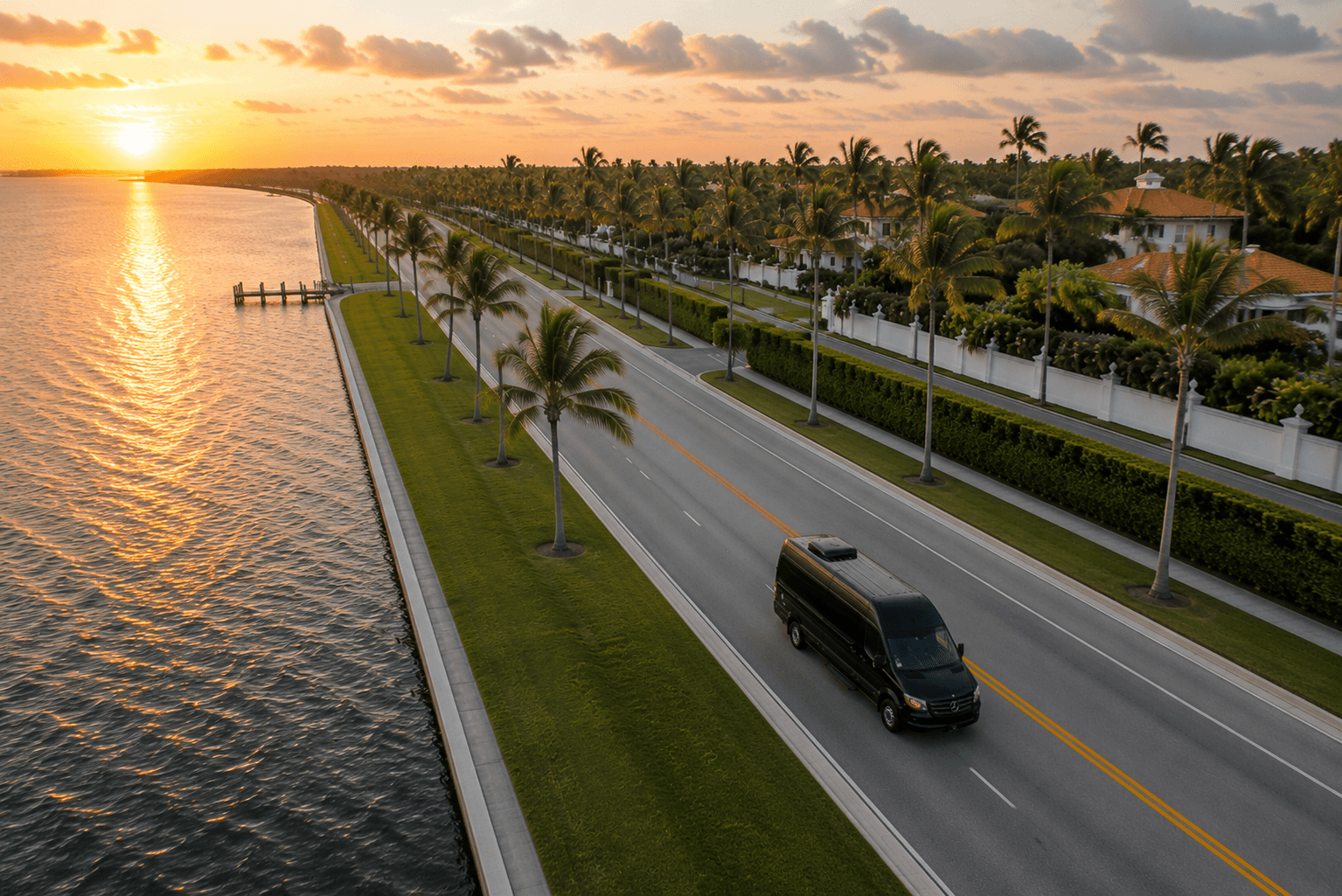 Miami Bus Company Sprinter van on a coastal road in Florida at sunset